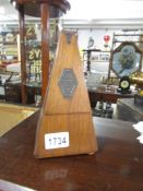 An old metronome, in working order.