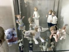 7 NAO (1 a/f) figures including Angel with concertina, ballerina, bear,