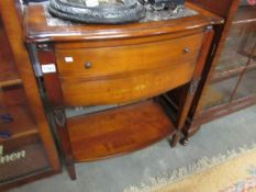 A mahogany single drawer side table with marble top.