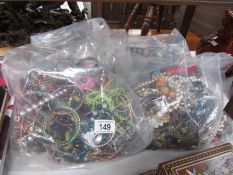 4 large bags of costume jewellery.