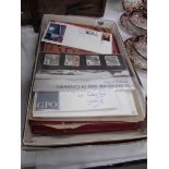 A quantity of UK stamps inlcuding 2 stock books, commemorative first day covers etc.