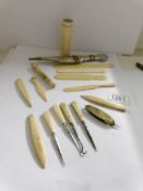 A collection of lat 19th/early 20th century ivory items including needle case,