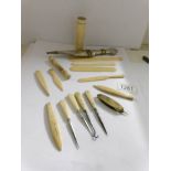 A collection of lat 19th/early 20th century ivory items including needle case,