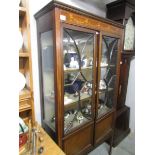 An Edwardian mahogany inlaid display cabinet.