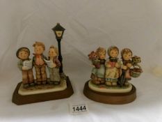 A boxed Hummel Goebel figure group 'The Tuneful Trio' and boxed 'Trio of Wishes'.
