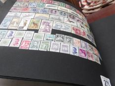 2 albums of GB and world stamps including Victorian.