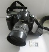 A Nikon D50 camera, works but needs attention.