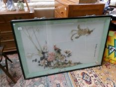 A large framed and glazed shell collage of birds of paradise (some pieces loose).