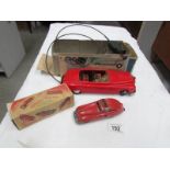 A boxed Schuco tin plate car and a Shuco FEX 1111 car.