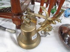 A brass ship's bell, smoothing iron and aeroplane,.