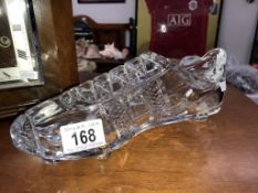 An unusual heavy glass football boot,.