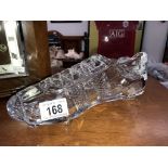 An unusual heavy glass football boot,.