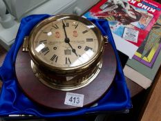 A good quality boxed modern brass ships clock.