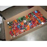 A large quantity of unboxed die cast tractors.