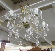 A 5 lamp glass chandelier.