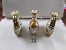 3 Royal Crown Derby candlesticks, 2 Rams and a Winged Bull Mythical Creature.