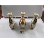 3 Royal Crown Derby candlesticks, 2 Rams and a Winged Bull Mythical Creature.