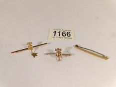A 9ct gold Lincoln Imp bar brooch, a yellow metal Lincoln Imp bar brooch and a 9ct gold bar brooch.