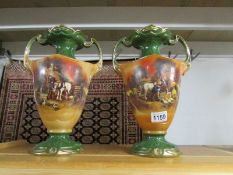 A pair of Staffordshire vases with ploughing scenes.