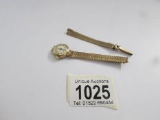 A 9ct gold Rotary 221 jewel ladies wrist watch on 9ct gold bracelet,