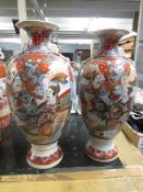 A pair of Imari vases.