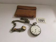 A silver pocket watch 'Gindrat' on silver watch chain with crab claw, T bar and swivel seal,.