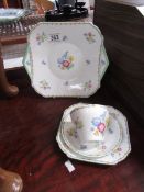 A Shelley wild flowers trio and cake plate (hairline crack to cup).