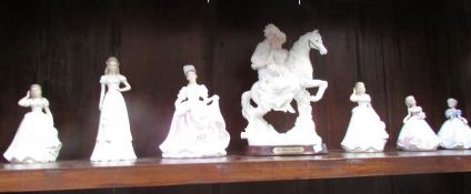 6 figurines and a couple on horse.