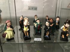 11 Royal Doulton Charles Dickens character figures including Fagin, Macawber, Urian Heep, Pecksniff,