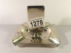 A silver ashtray incorporating match box holder,.