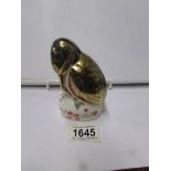 A Royal Crown Derby paperweight, bird with fish in beak.