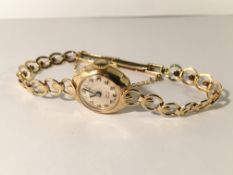 A 9ct gold Rotary watch and bracelet, 12.44 grams.