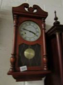 A wall clock,.