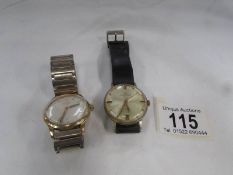 A Roamer Popular wrist watch and a Swiss wrist watch.