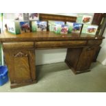 A Victorian mahogany double pedestal sideboard.