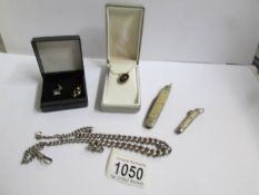 3 gold pendants (one on chain), 2 pen knives and a silver watch chain.