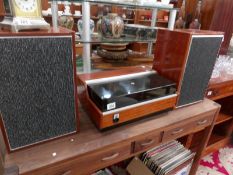 A Rigonda party time calypso stereo with speakers.