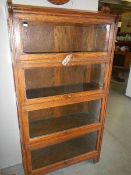 A 4 tier Globe Wernick style bookcase (no maker's labels present).