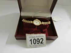 A ladies 9ct gold Rotary wrist watch on 9ct gold bracelet.