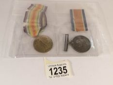 A WW1 war and victory medals for Act. Cpl. Shuttleworth, A.S.C.