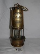 A brass Eccles type 6 miner's lamp.