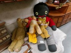 A quantity of vintage soft toys including Golly.