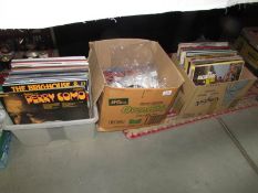 3 boxes of LP records and approximately 18 45 rpm records.
