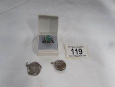 A silver ring set green stone, a silver locket and a silver St, Christopher,
