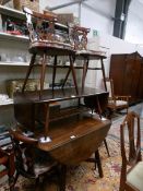 An Ercol drop leaf table and 4 chairs.