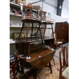 An Ercol drop leaf table and 4 chairs.