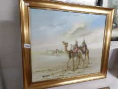 A fine gilt framed oil on canvas 'Desert Camp Scene', signed.