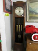 A long cased Enfield clock with pendulum and weights, (no glass to door).