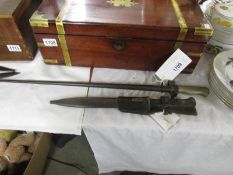 A French model 1886 Leebel 'Rosalie' bayonet with scabbard and a German model 1884/98 second