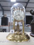 A good German 'Kundo' anniversary clock under glass dome, working.